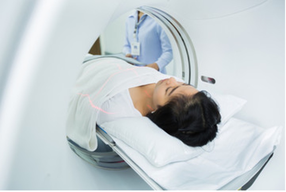 Person receiving a CT Scan.